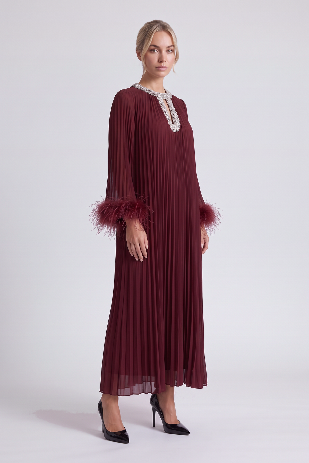Odessa Feather Dress in Burgundy - three-quarter view