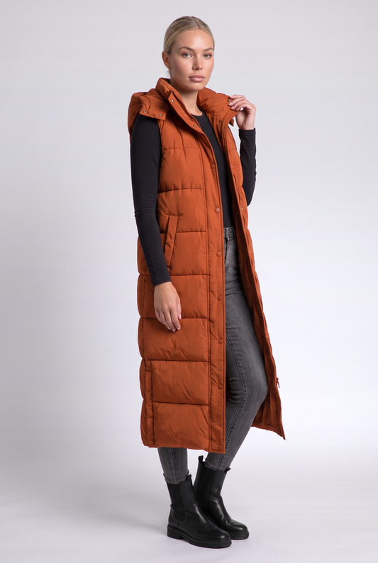 Sabine Puffer Vest in Orange - three-quarter view