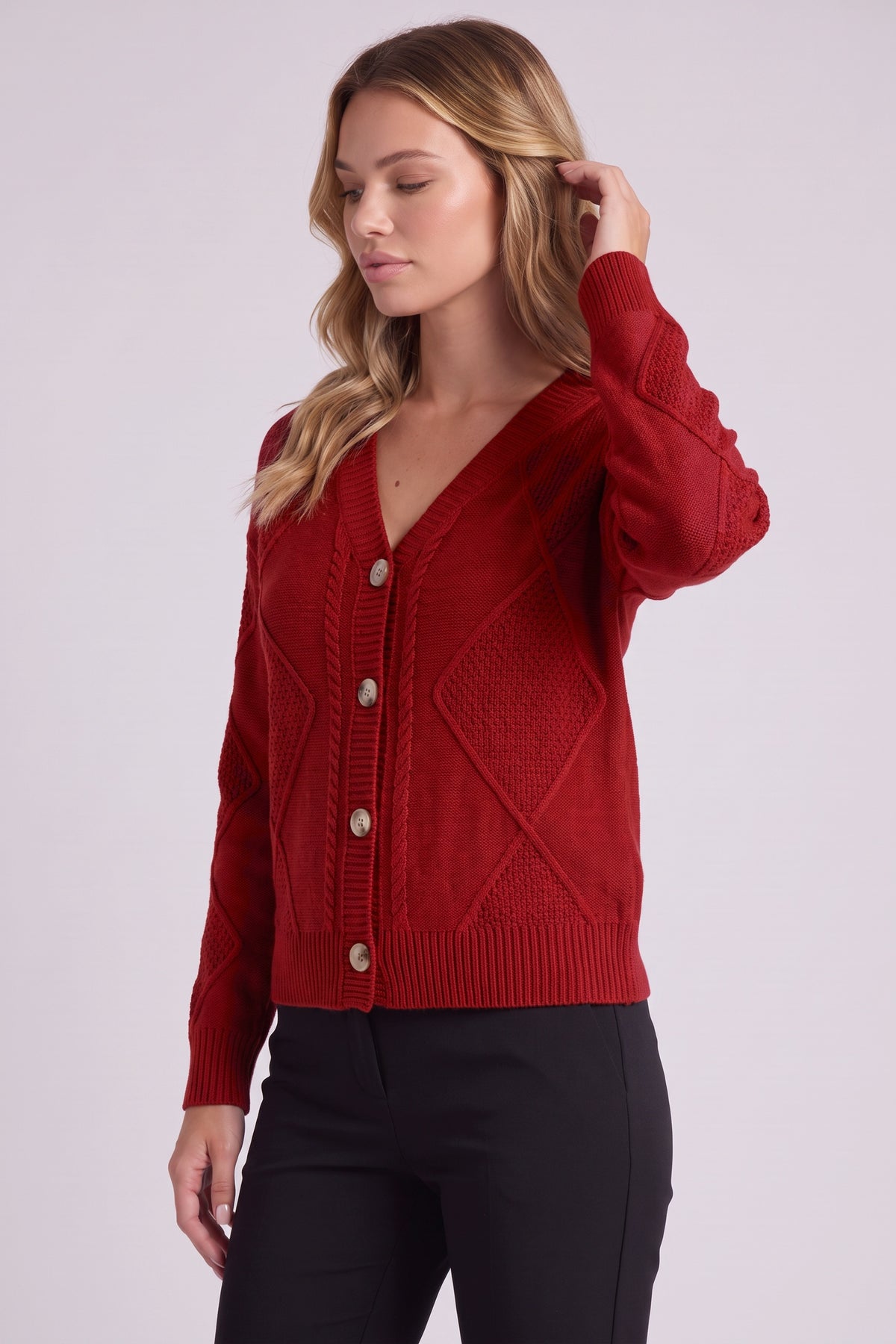 Maren Cable Knit Button Cardigan in Red - three-quarter view