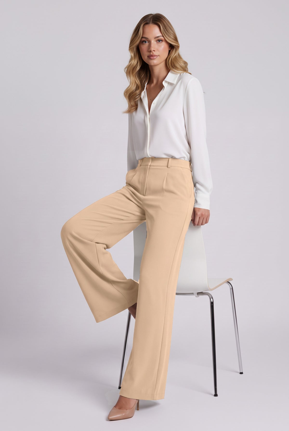 Elise Trousers in Beige, seated stretch demonstration
