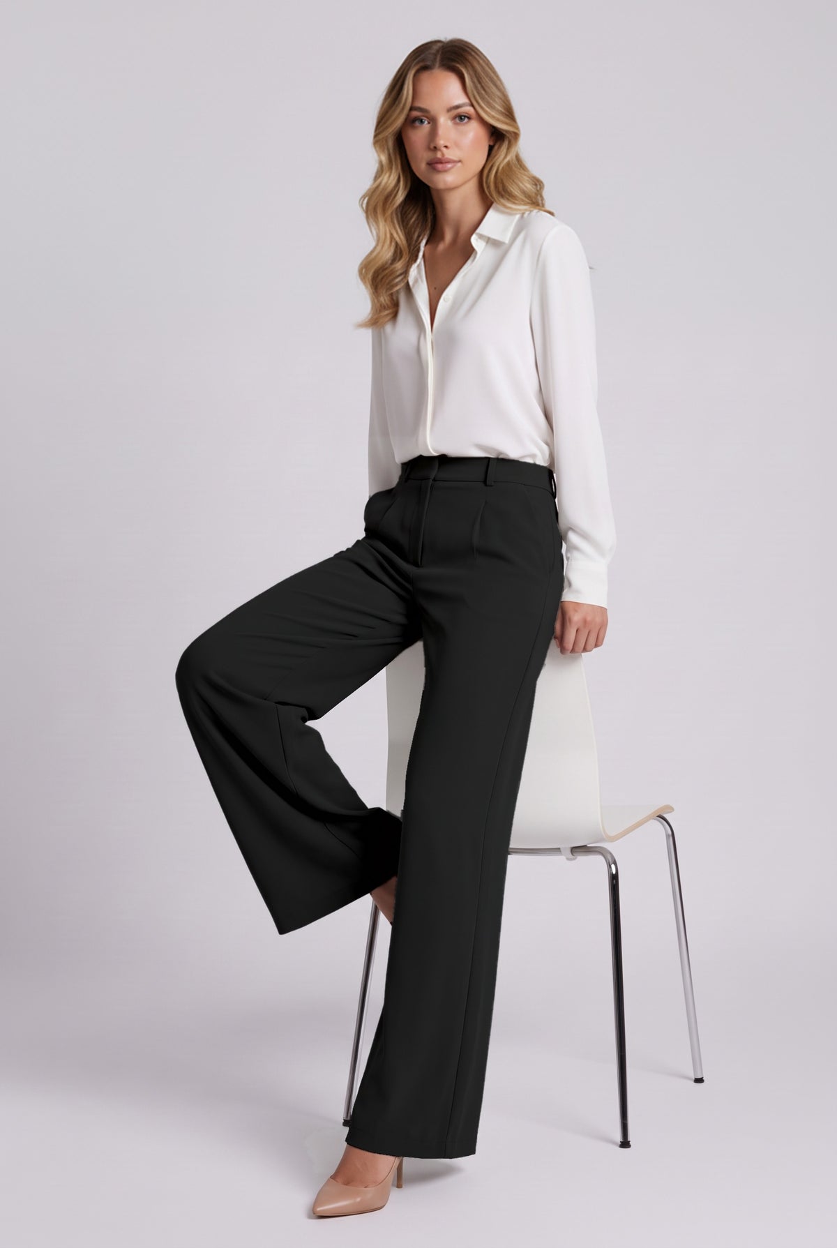 Elise Trousers in Black, seated stretch demonstration