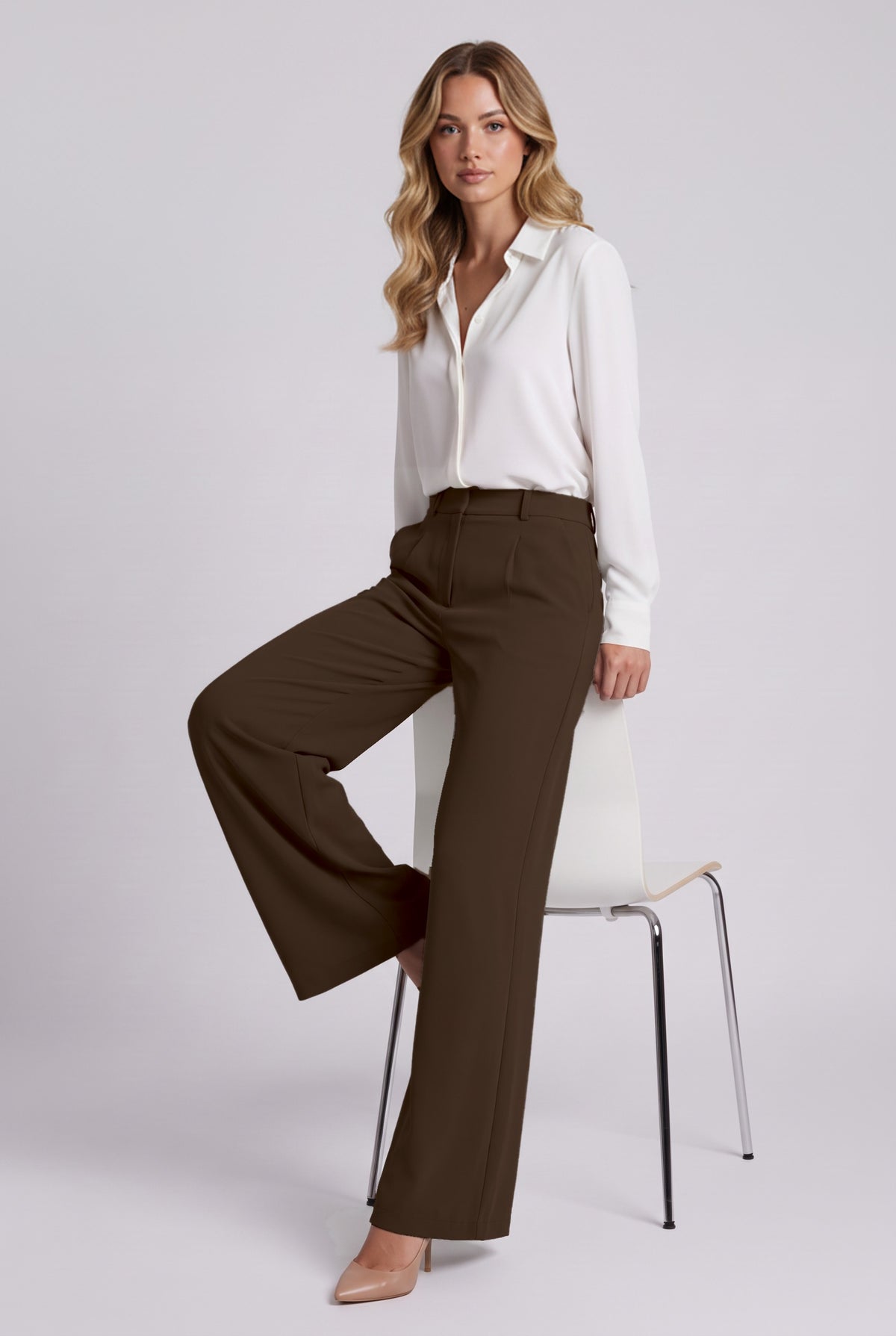 Elise Trousers in Brown, seated stretch demonstration