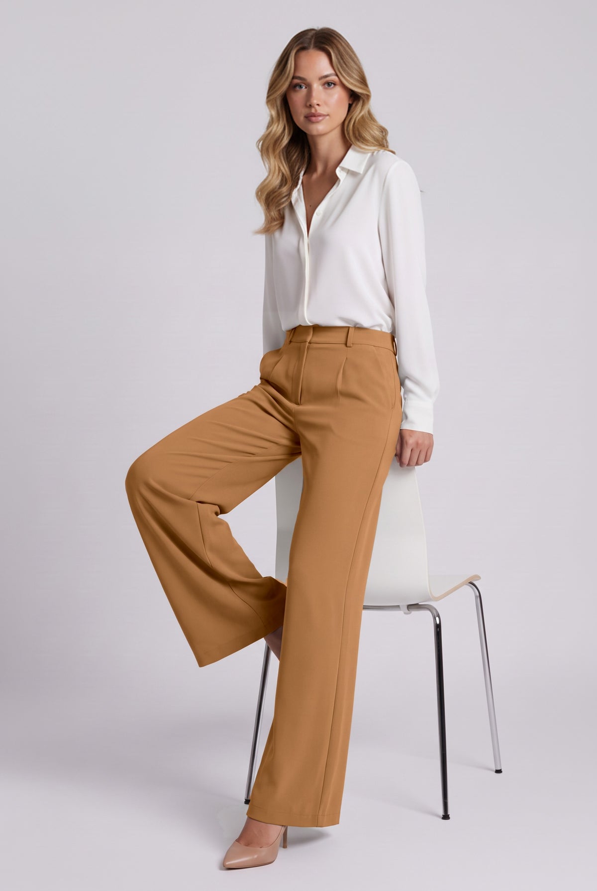 Elise Trousers in Camel, seated stretch demonstration