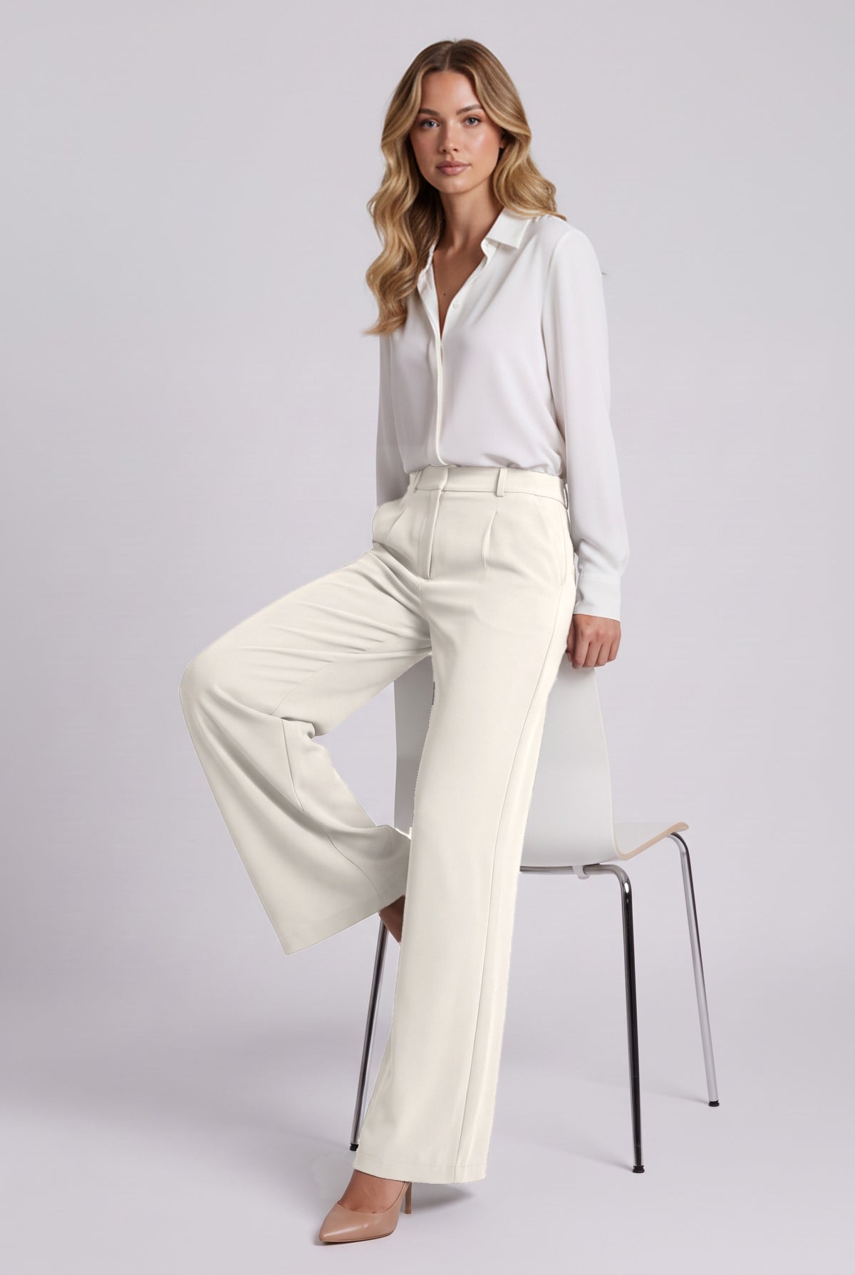Elise Trousers in White, seated stretch demonstration
