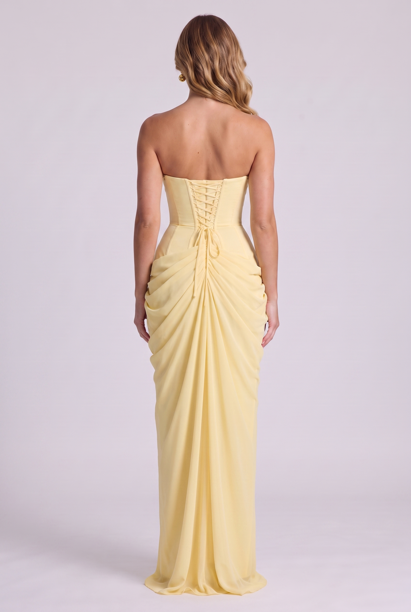 Ophelia Corset Maxi Dress in Lemon - back view showing lace-up corset closure