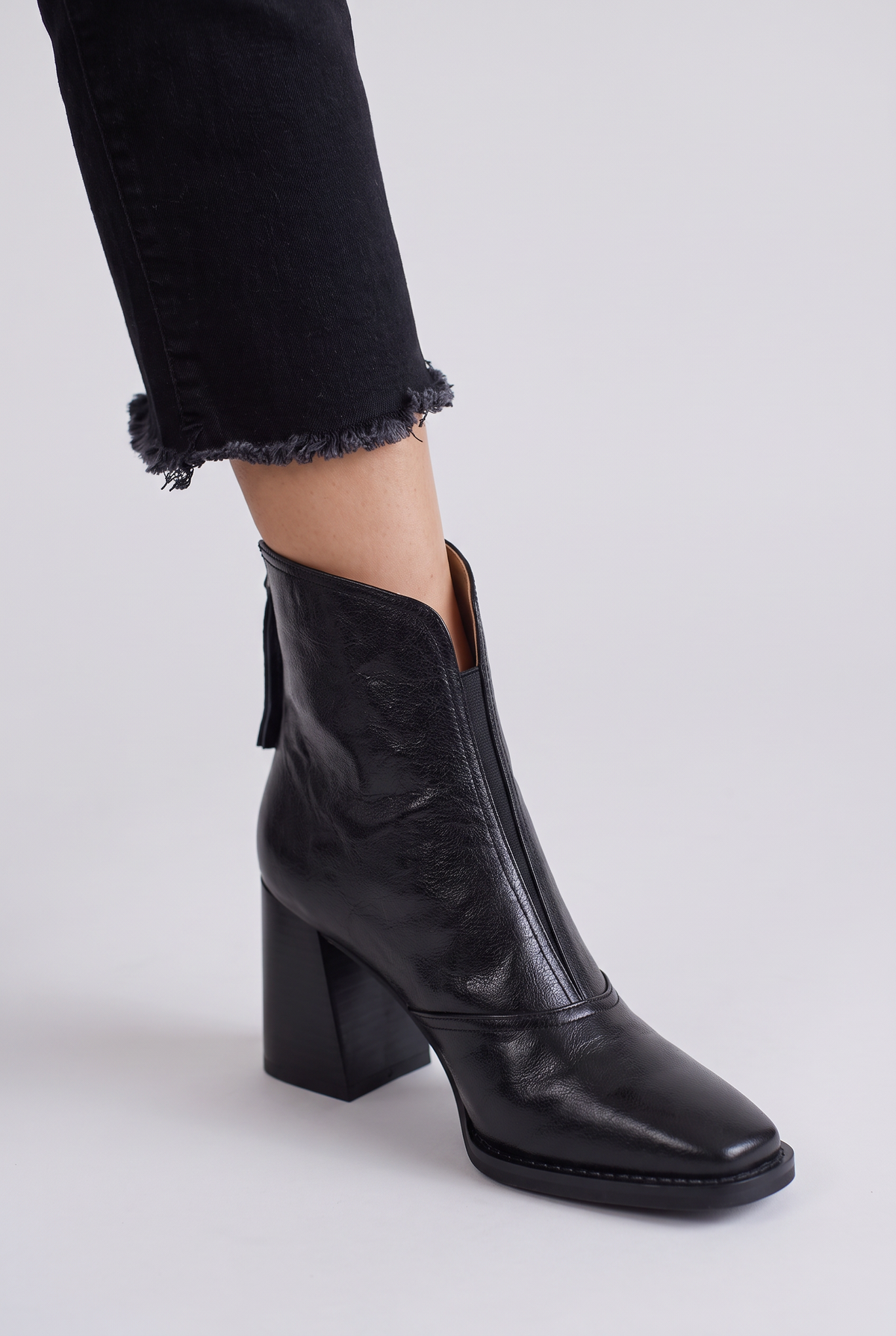 Noemi Square Toe Ankle Boots in Black, front three-quarter view