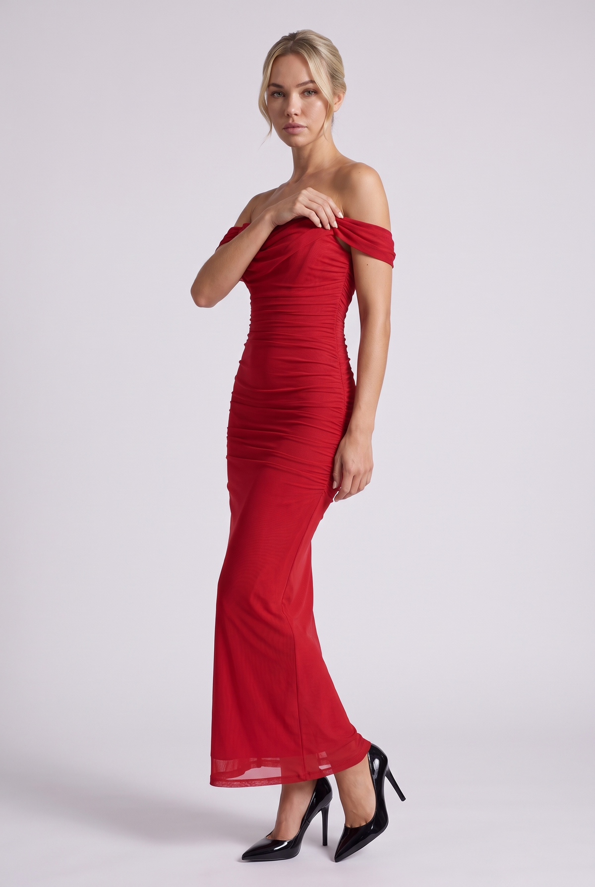 Lucienne Off-Shoulder Ruched Maxi Dress in Red - three-quarter view