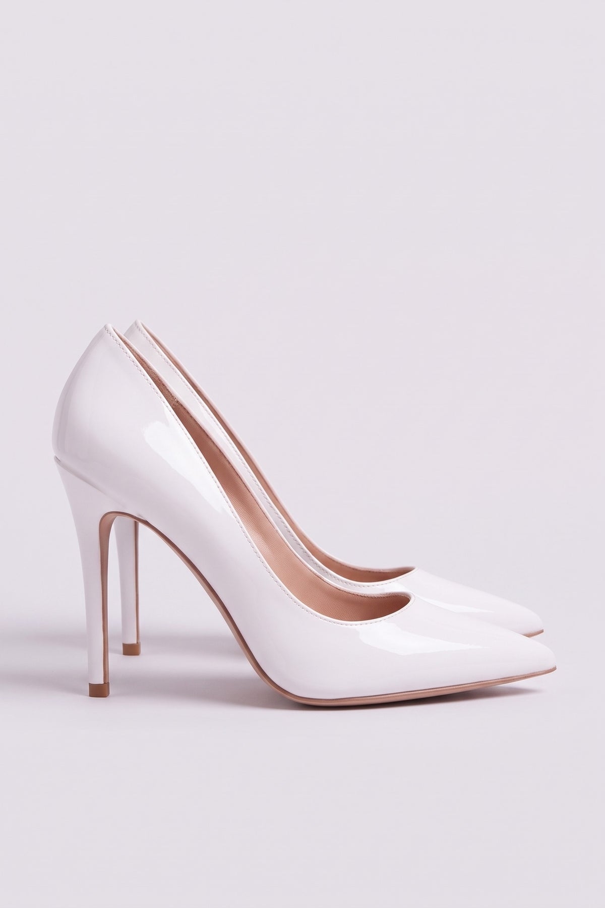 Margot Patent Pumps in White, pair side view