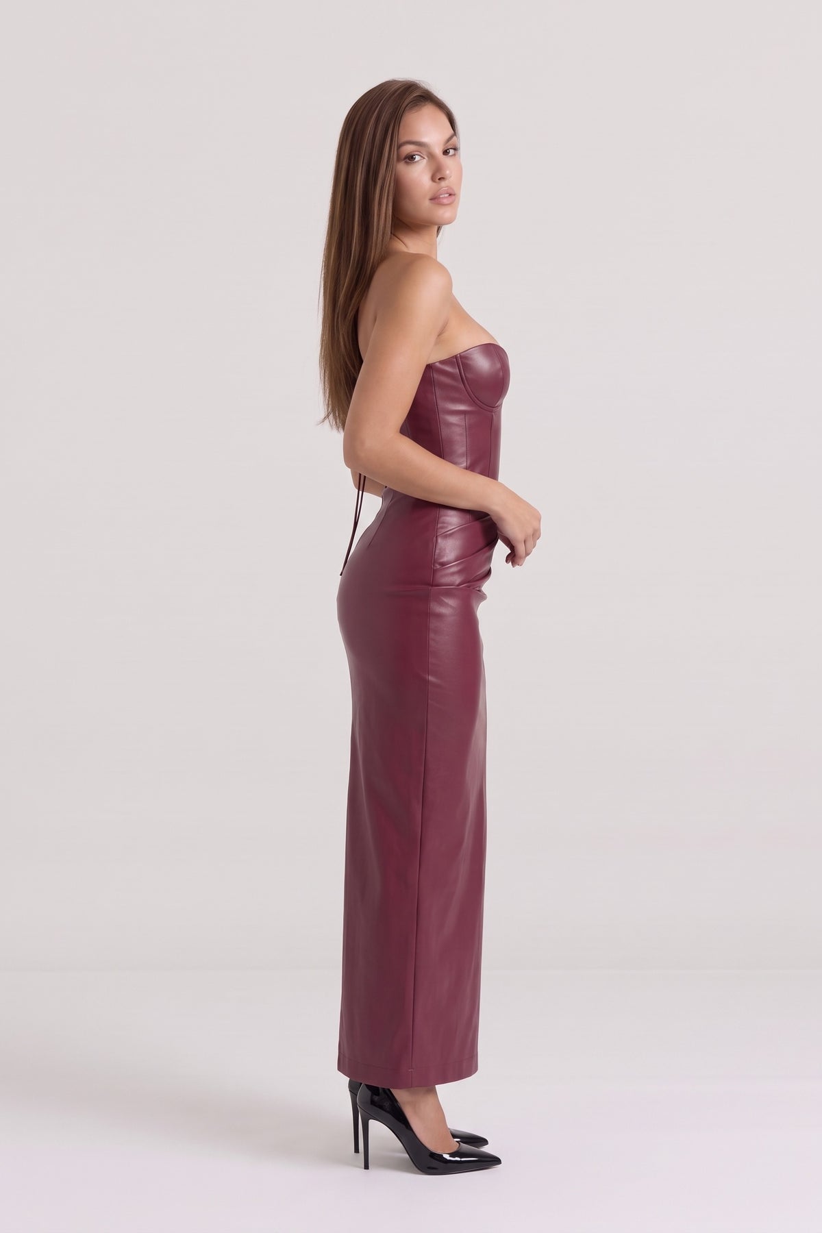 Scarlett Faux Leather Corset Maxi Dress in burgundy, side view